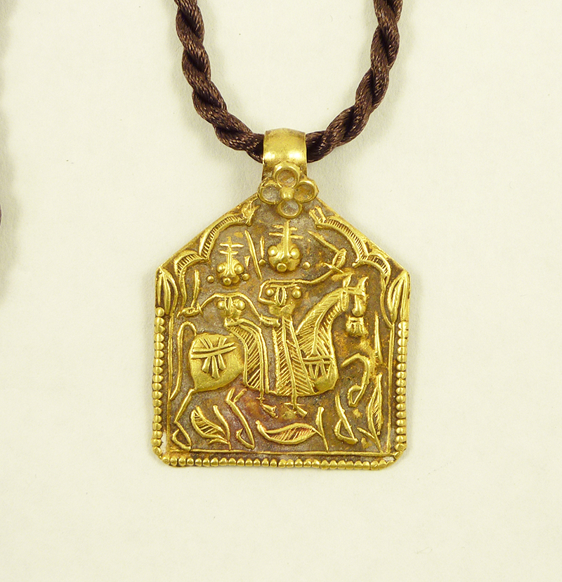 Gold Indian amulet