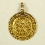 Gold indian amulet